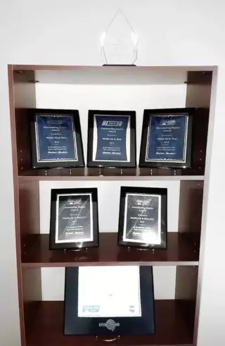 Our trophy case, showing off all of our awards